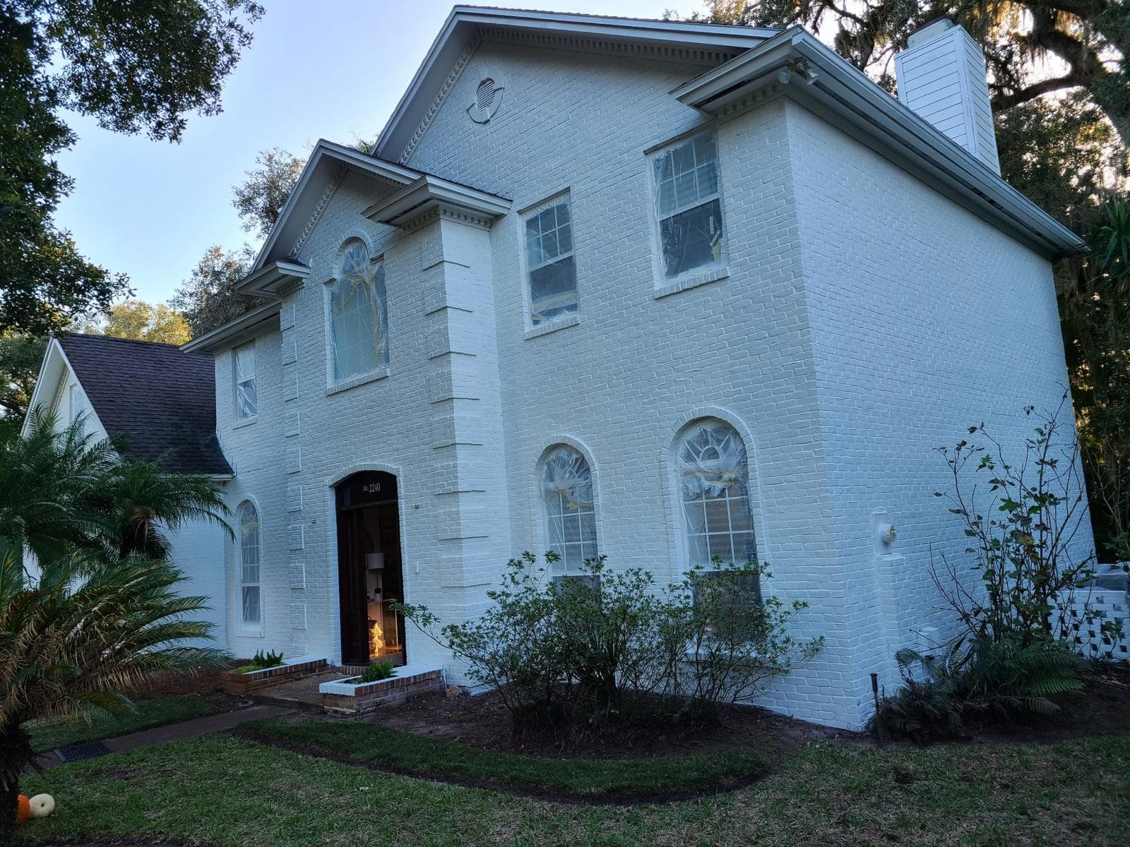 Large Brick Home Painting
